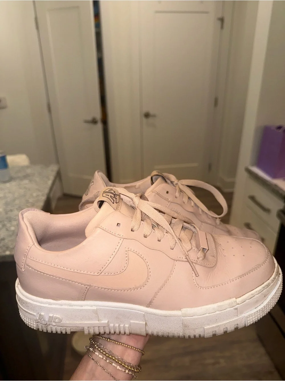 Nike Women’s Air Force 1 Sneakers in Pale Pink